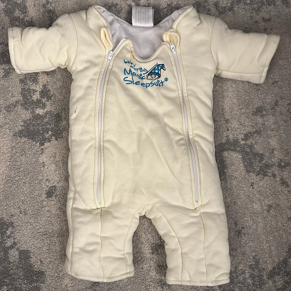 Baby merlin magic sleep suit size small